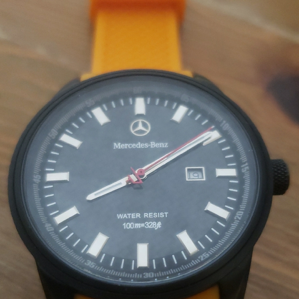 Mercedes-Benz Black and Orange Watch